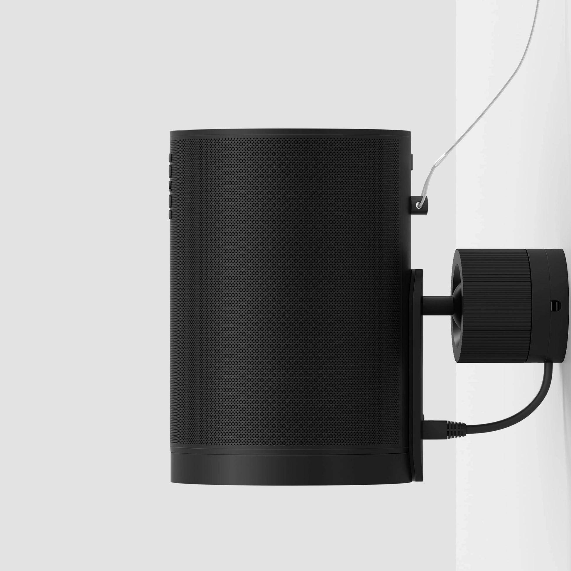 Era 100 Pro speaker mounted on wall with Power over Ethernet setup for efficient audio solutions.